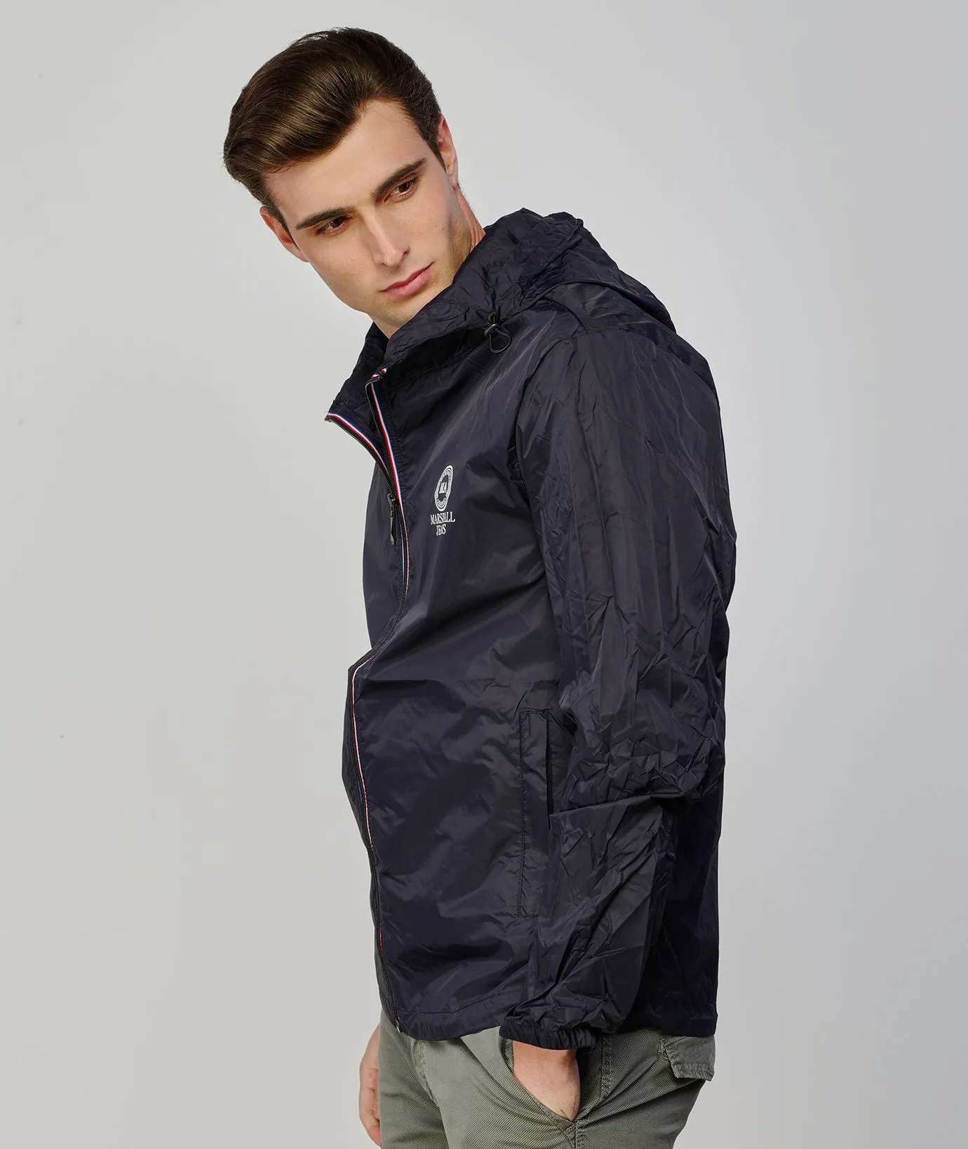 Giacca antivento blu con zip
