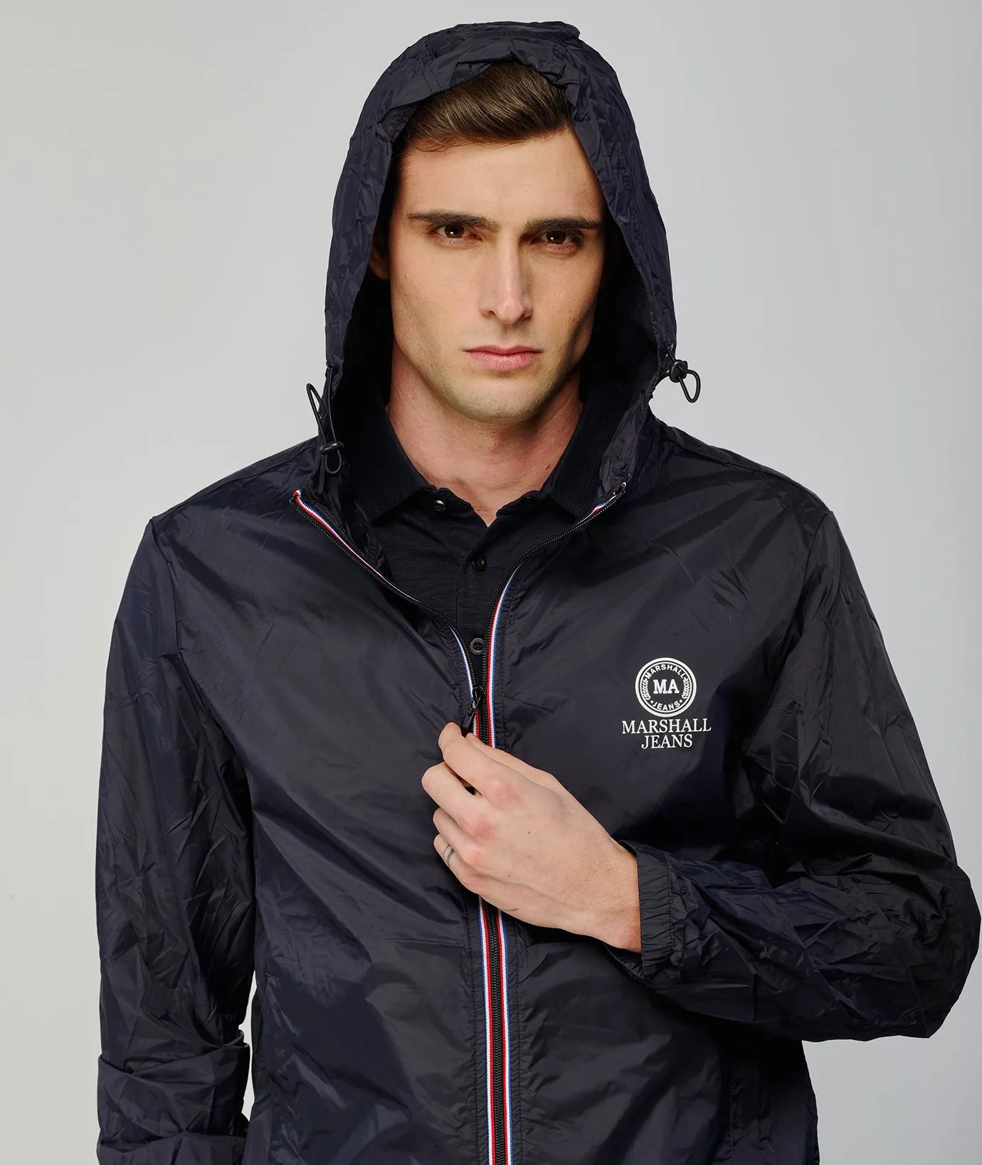 Giacca antivento blu con zip