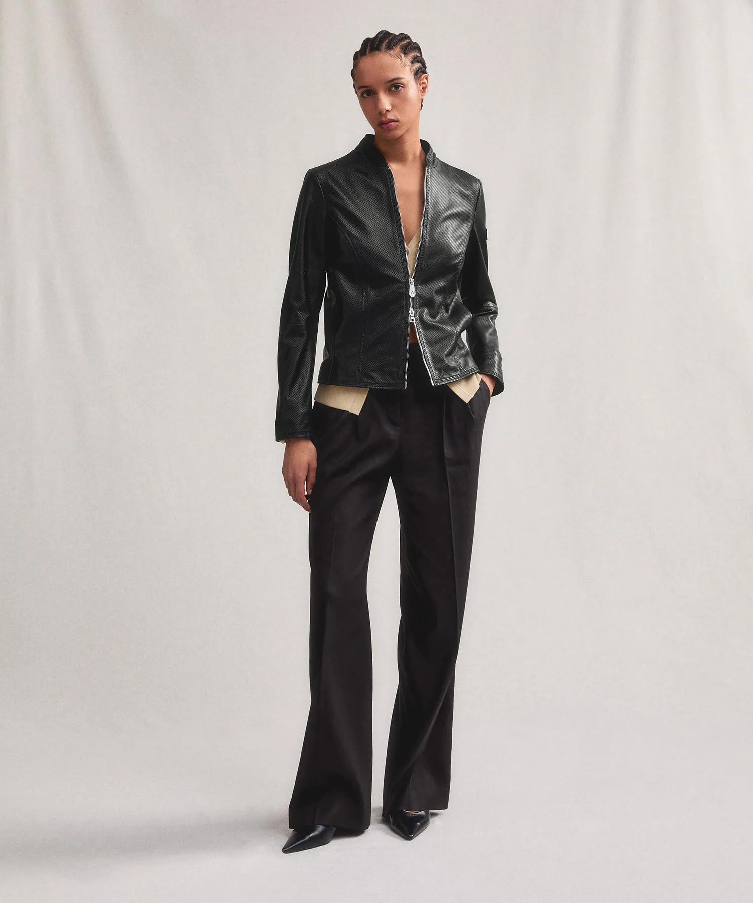 Giacca biker lucida in pelle traforata