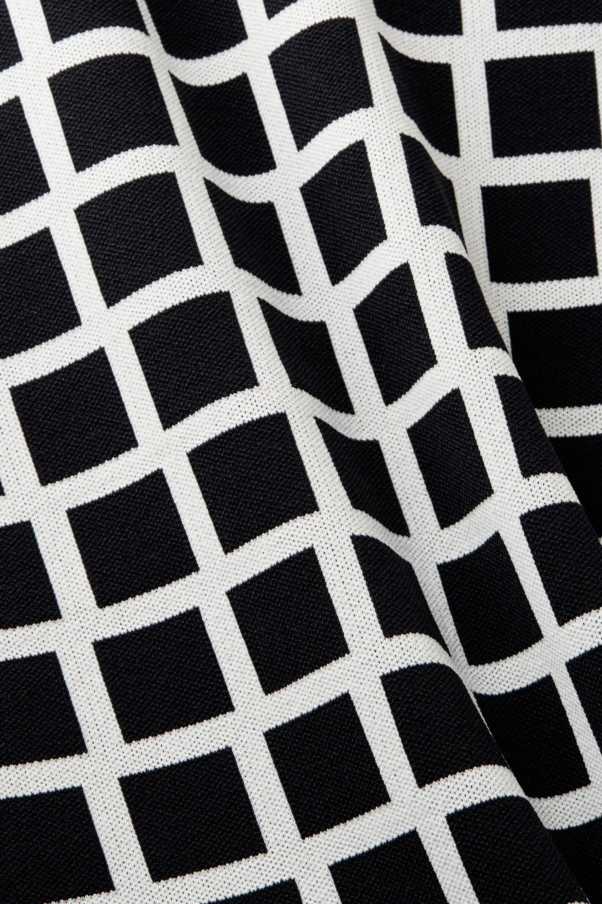 Gonna midi in maglia jacquard con logo