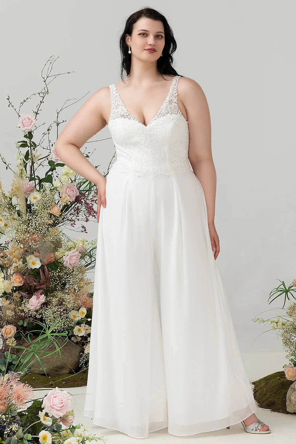 Tuta avorio in pizzo e chiffon per matrimonio